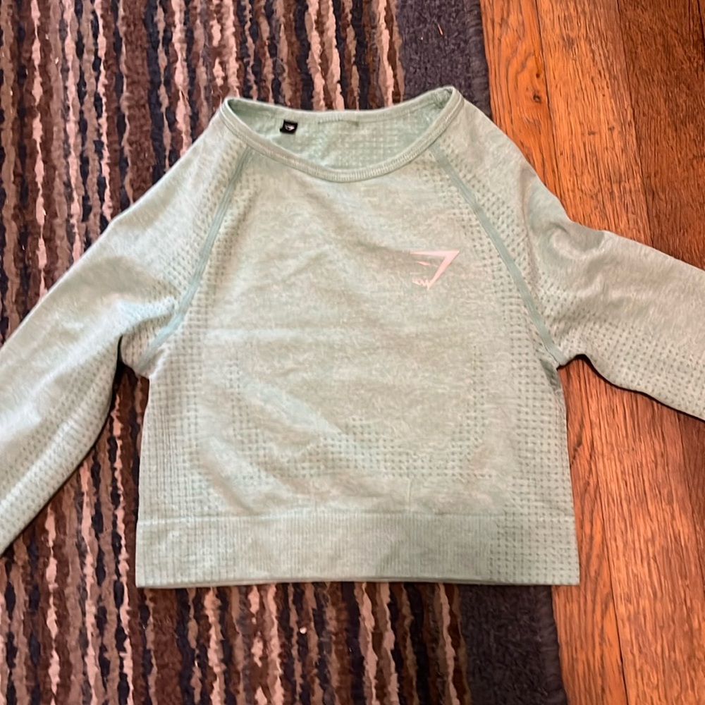 gymshark , green compressing shirt